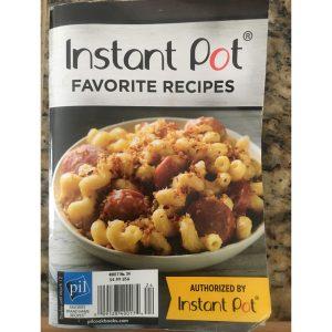 recipe booklet with a bowl of mac n cheese on the cover