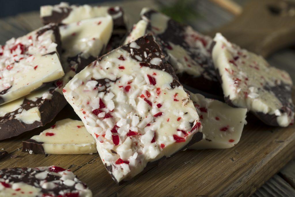 chunks of white and dark chocolate with peppermint pieces - peppermint bark